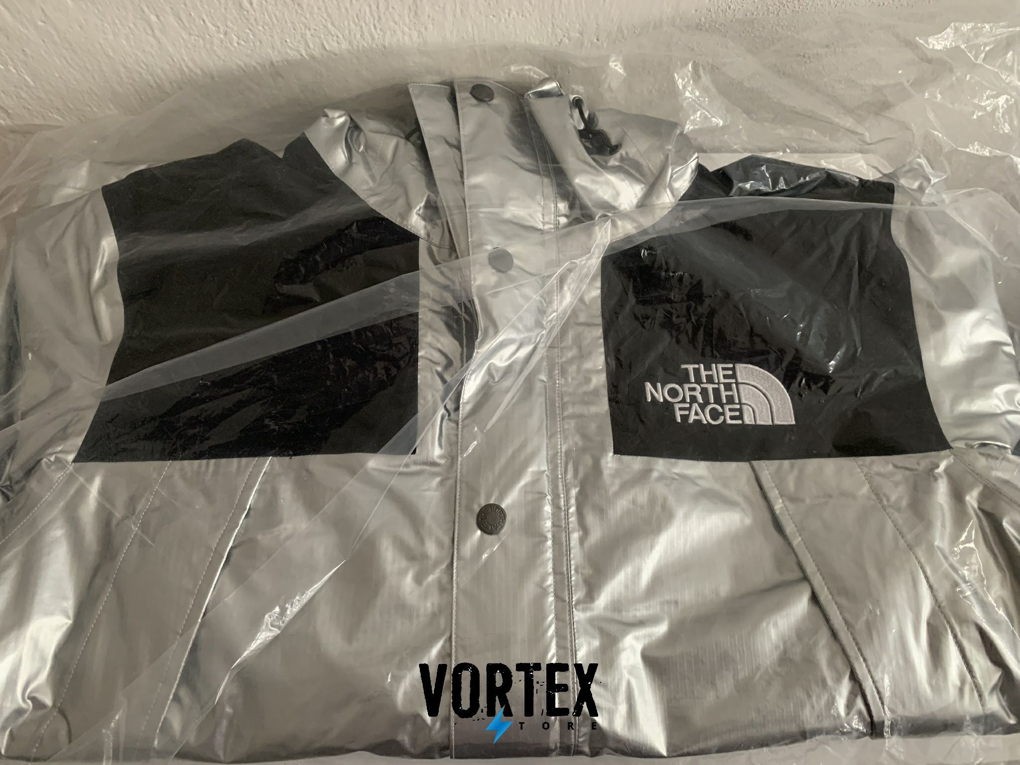 Supreme The North Face Metallic Parka Silver
